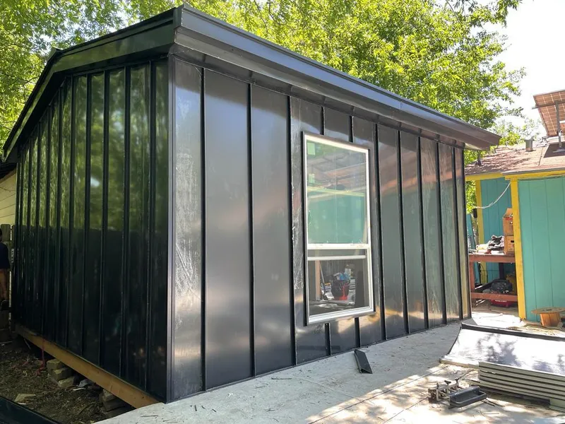 Black standing seam metal wall panels for Roof Inspection in Lone Tree