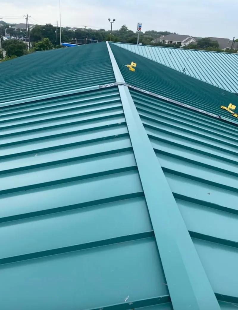 Green commercial metal roof ridge and valley for Metal Roof Repair in Lone Tree