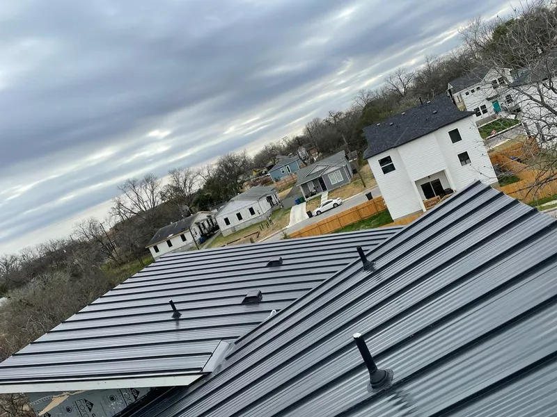 Standing seam metal roof panels with vents for Skylight Repair in Lone Tree